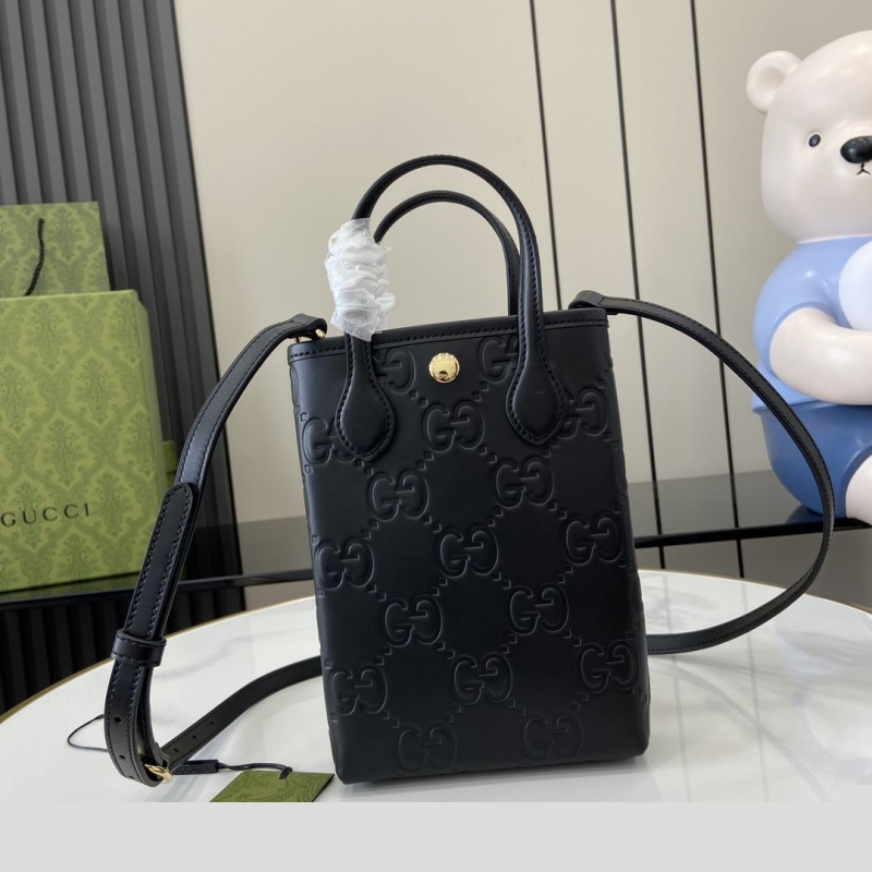 G*u*i top handle bags